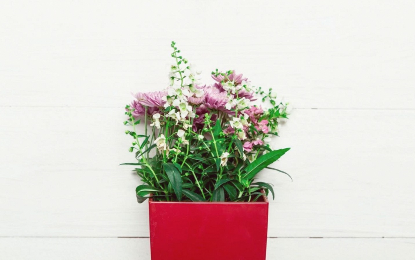 Mobile floral event setup with fresh arrangements on site